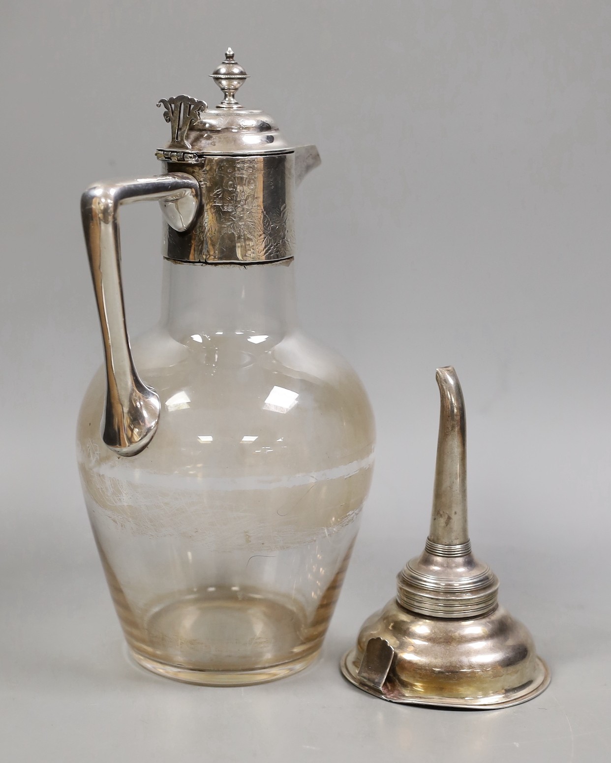 A George III silver wine funnel, James Mince, London, 1794, 12.5cm, together with a silver plate mounted glass claret jug.